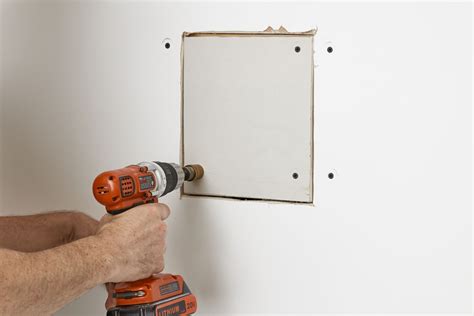 how to patch junction box holes in the drywall|installing drywall patch over outlet.